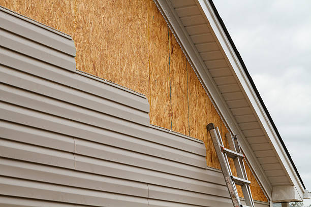 Professional Emergency Siding Repair technician working in Canal Winchester, OH